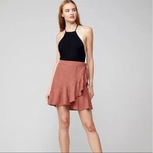 Free People “Ruffle My Feathers” Wrap Skirt in Terra Cotta Desert Rose